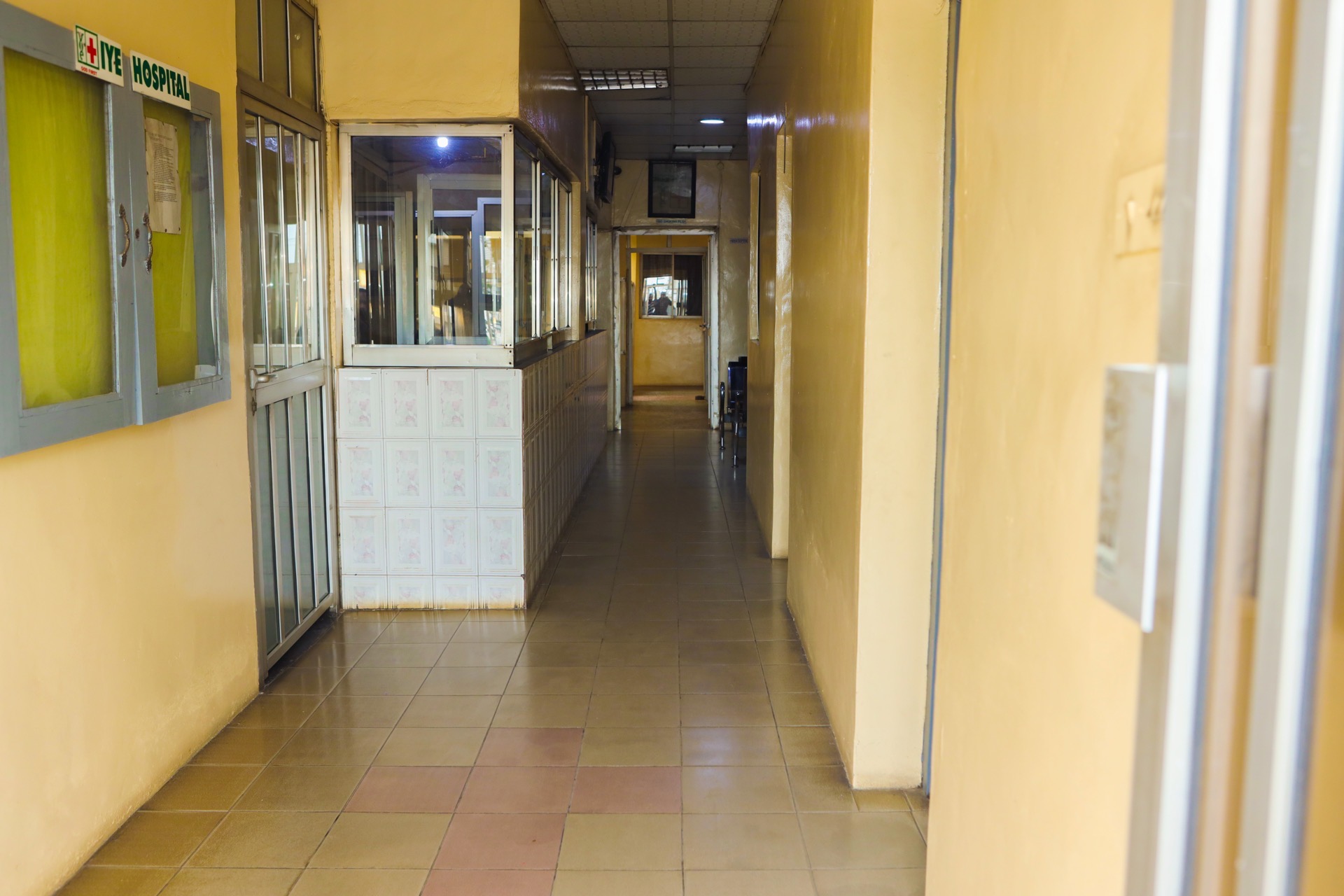 IYE Hospital interior hallway with cross pattern floor tiles